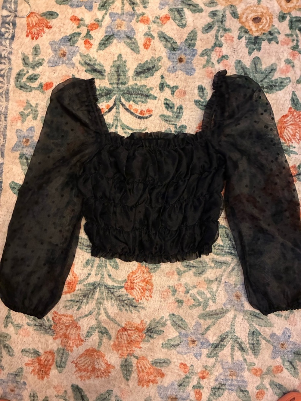 Hers & Mine L stretchy polka dot blouse with sinching and a puff sleeve.